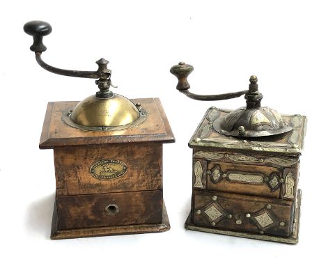 A vintage French Peugeot Freres coffee grinder; together with a further vintage coffee grinder
