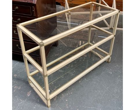 A 20th century Zevi style cream enamel and gilt metal glass inset three tier console table, 100x40x75cmH 