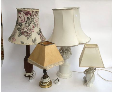 An Italian ceramic table lamp with encrusted flowers, 70cmH to top of shade; together with three other table lamps (4) 