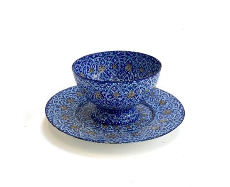 A Persian minakari enamel teacup, 8cmD and saucer, 13cmD