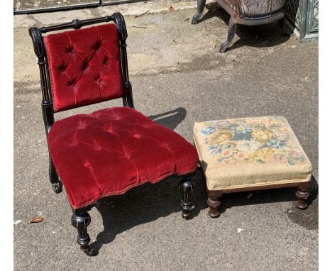 An Aesthetic movement ebonised button upholstered slipper chair; together with a small footstool 