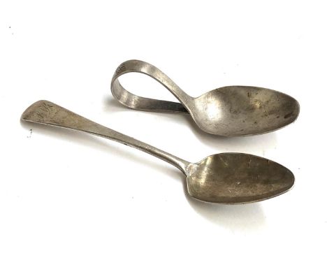 A George III silver tea spoon; together with an early 20th century silver caddy spoon (2) 