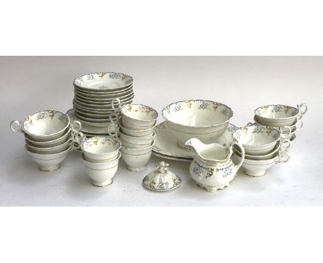 A 19th century part tea service, approx. 40 pieces, hand painted blue and gilt pattern, gold script pattern no. 3/254 to base