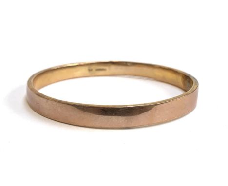 A 9ct gold bangle (soldered shut), 7.5cmD, 10.3g 