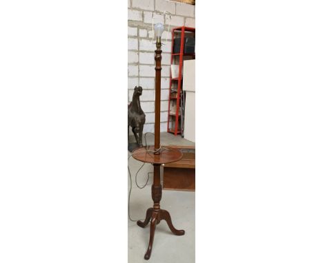 A mahogany standard lamp with dish table section, 140cmH 