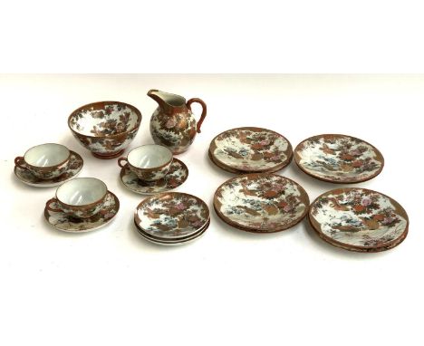 A collection Japanese Meiji era Kutani ceramics, comprising side plates (8), teacups (3), saucers (6), bowl, and jug, marks a