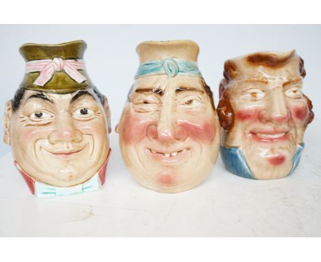 3x Sarreguemines majolica French grotesque heads. One with chip. 22cm