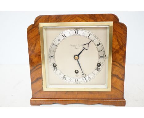 Elliot mantle clock, retailed by Gerrard & Co 1967 plaque to verso 22cm