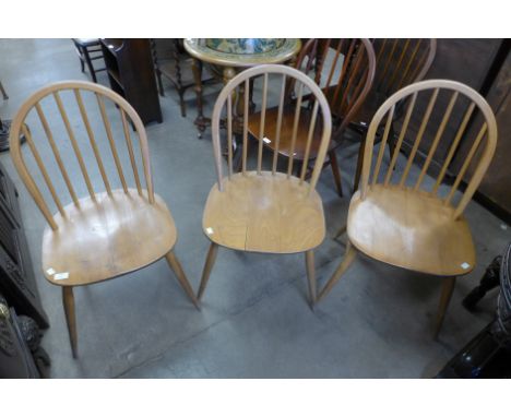A set of three Ercol Blonde elm and beech Windsor chairs 
