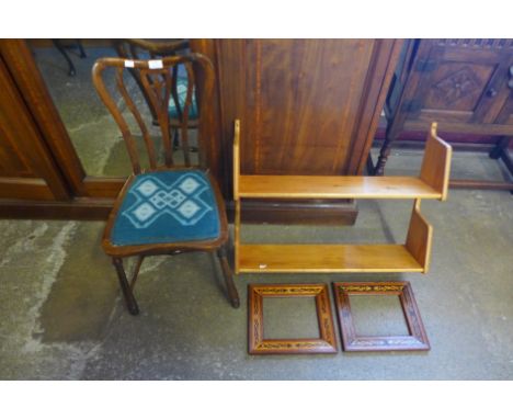 An Edward VII beech bedroom chair, a pair of marquetry frames and a pine wall shelf 