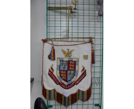 An armorial crest tapestry wall hanging 