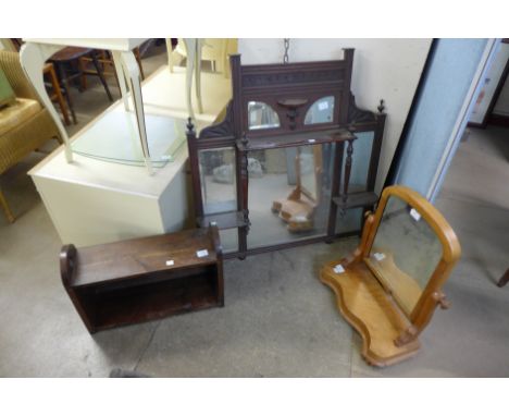 A Victorian satin birch toilet mirror, an Edward VII mahogany overmantel mirror and a beech book shelf 