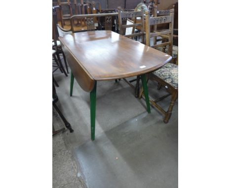 An Ercol Golden Dawn painted elm Windsor drop-leaf table 