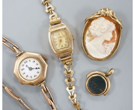 A lady's 9ct gold manual wind wrist watch, on a 9ct expanding bracelet gross 13.6 grams, one other lady's 9ct gold watch on a