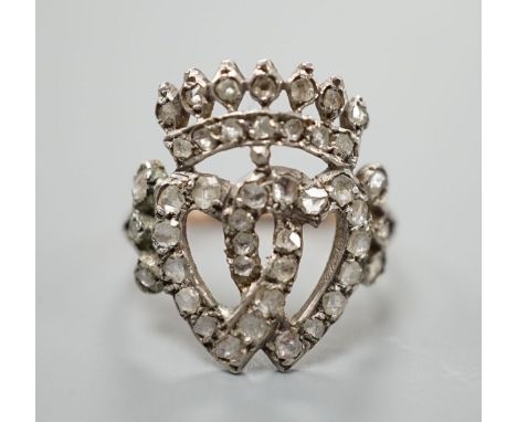 A 19th century, yellow and white metal, rose cut diamond set twin hearts and coronet ring, size  K, gross weight 2.6 grams.