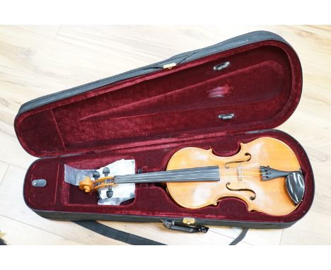 A cased viola by Robert Hull, label dated 1976, Hutton, Merseyside.Length 68 cms,