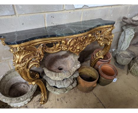 An 18th century style serpentine giltwood marble top console table, width 123cm, height 87cm