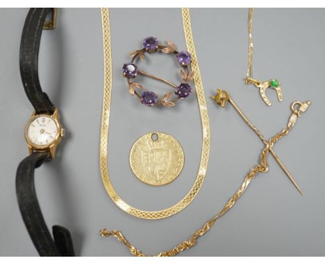 A modern 9ct gold necklet, 4.2 grams, a 14kt bracelet and necklace gross 3 grams, a worn gold coin, a yellow metal and gem se