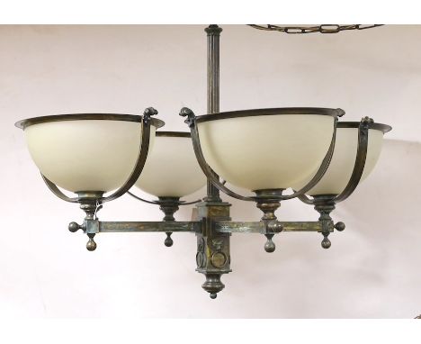 A brass 4 branch ceiling light with opaque glass shades,72 cms high x 94 cms wide.