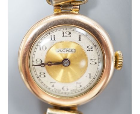 A lady's early 20th century 9ct gold manual wind wrist watch, on a '9ct on Sil' expanding bracelet.