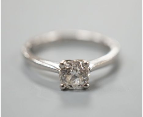 A modern platinum and solitaire diamond ring, size K, gross weight 3.6 grams,the stone weight approx. 0.50ct,