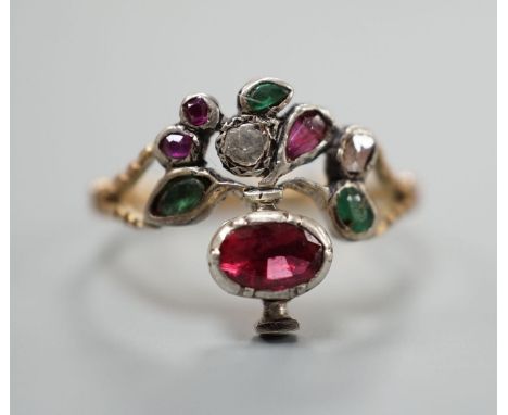 An early 20th century continental? Arts &amp; Crafts yellow metal and multi gem set cluster ring, size P, gross weight 2.4 gr