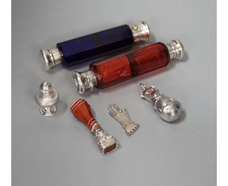Two Victorian white metal mounted ruby or blue glass double ended scent bottles, 12.5cm, an agate mounted seal, a modern silv