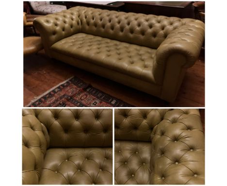 Pale Mustard buttoned back and seat Chesterfield sofa on turned mahogany legs supported by brass castors&nbsp; &nbsp; 210 cms