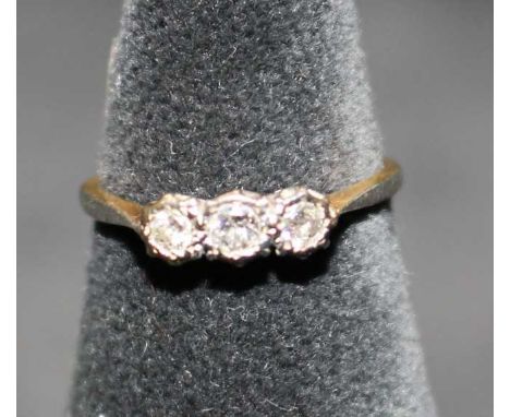 18ct Yellow Gold and Platinum three stone diamond ring.&nbsp;
It is hallmarked 18CT PLAT.&nbsp;
There is three old cut solita