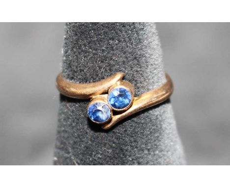 9ct Rose Gold two stone sapphire ring.&nbsp;
There is two round old cut sapphires. They are approx 3mm each. The ring is hall