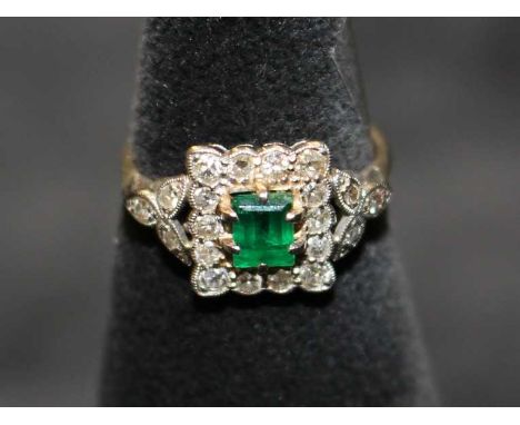 Art Deco Emerald and Diamond cluster ring.&nbsp;
The Emerald is emerald cut and is approx 0.42ct.&nbsp;
There is twenty surro