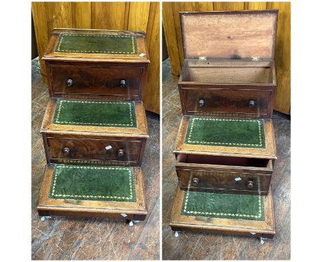 Three step library style steps/ bed side with lift up lid, drawer and leather tops over modern castors.