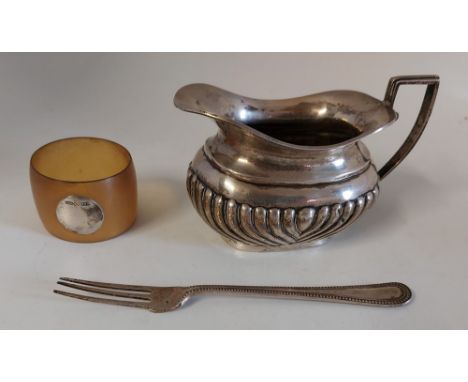 A George Nathan &amp; Ridley Hayes creamer in&nbsp; silver , hallmarked Birmingham, a child's&nbsp;silver fork, with a prong 