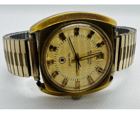 



A Mondia "Top Second" Automatic gentleman's wrist watch. Untested but appears to run when activated and the red light app