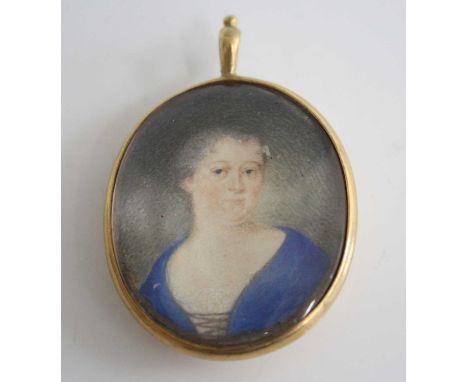 Early 19th century English school - bust portrait of a middle-aged woman wearing a blue dress, miniature watercolour on ivory