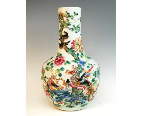 A 19th century Chinese famille rose tianqiuping vase, enamel decorated with exotic birds amidst flowering branches, h.38.5cmT