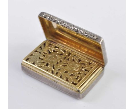 A William IV silver vinaigrette, of rectangular form with engine turned decoration and vacant cartouche, the gilded grille pi