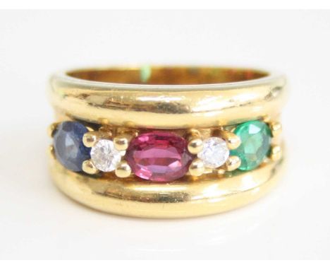 A yellow metal, sapphire, ruby, emerald and diamond five stone half hoop ring, the oval sapphire dimensions approx 4.91 x 4 x