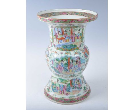 A 19th century Chinese Canton famille rose porcelain vase, of Gu form, enamel decorated with figural reserves upon a floral g