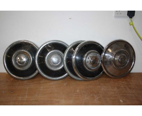 Assorted vintage motor vehicle parts and accessories, to include 5x Riley hub-caps, Shelley spanners, dashboard clock, Terry'