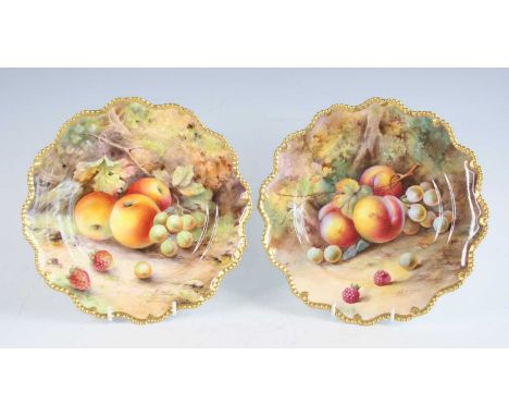 Two Worcester porcelain cabinet plates, decorated with fruit on a mossy bank by R Austin and Horace Price, each signed, withi