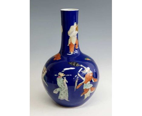 A Chinese Republic period porcelain tianquiping vase, enamel decorated with the eight immortals upon a sprayed cobalt ground,