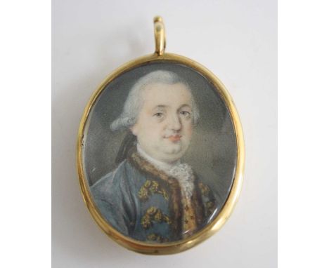 Early 19th century English school - half-length portrait of a gentleman wearing a blue tunic, miniature watercolour on ivory,