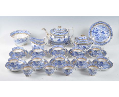 An early 19th century porcelain blue and white part tea and coffee service, after Spode's Broseley pattern in the London shap