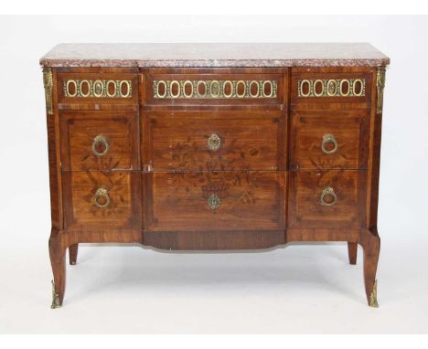 A French Napoleon III walnut and rouge griotte marble topped commode, having three blind frieze drawers with gilt brass mount