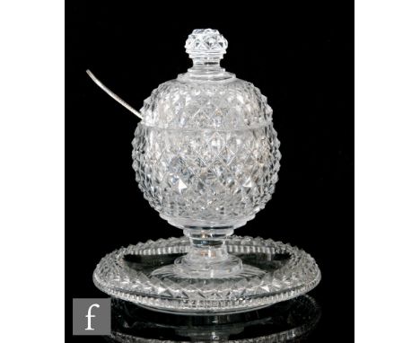 An early 19th Century Irish preserve jar, circa 1800, of globe form, the body and cover cut with diamonds, on a pedestal foot