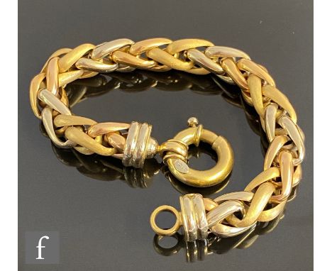 An 18ct three coloured gold bracelet with intertwined alternating links terminating in a large bolt ring fastener, weight 28.