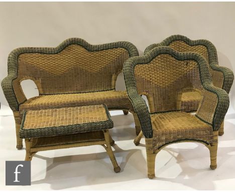  A plastic wicker garden suite comprising a two-seater sofa, two chairs and a matching table, width of sofa 135cm and width o