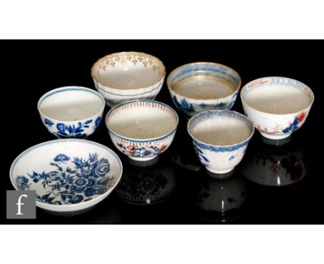 A late 18th Century Worcester teabowl and saucer decorated in the underglaze blue and white Three Flowers pattern, C mark to 