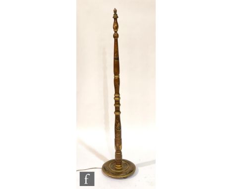 A 1930s chinoiserie lacquered standard lamp and shade decorated with figures on a pale brown ground, on turned base, height 1